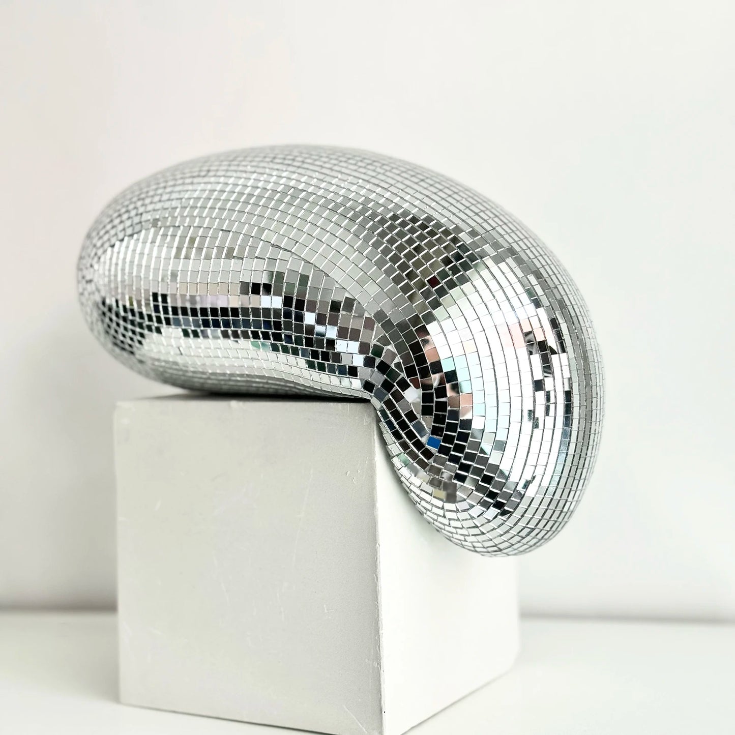 Transform your space with the Melting Disco Ball Home Decor, a stylish and versatile piece that adds glamour and charm to any setting.