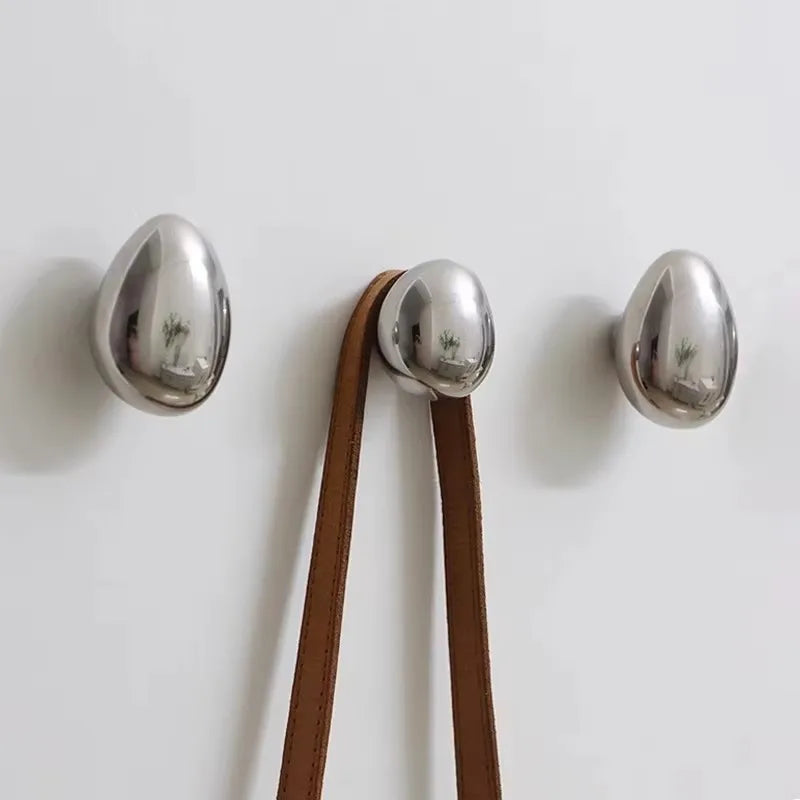 Enhance your space with our colorful ceramic wall hooks, featuring a modern design, durability, and easy suction cup adhesion for any room.