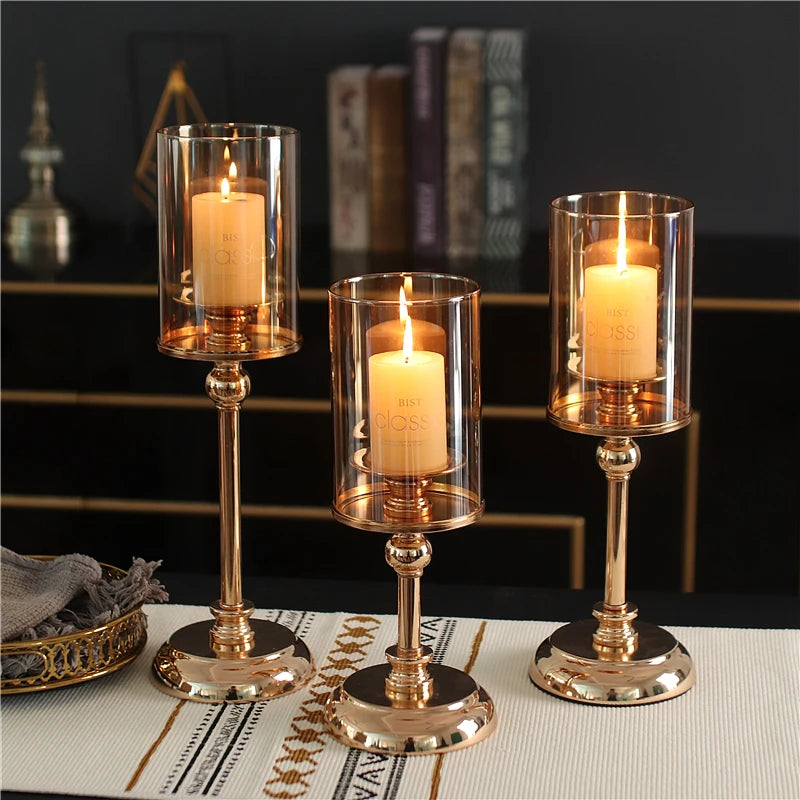 Elevate your home decor with our elegant golden glass candle holder, perfect for pillar candles at weddings, parties, or dining tables.