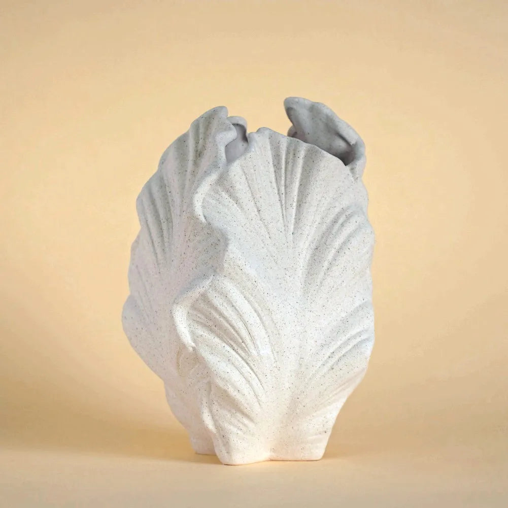 Elevate your home decor with our Ceramic Irregular Vase, perfect for creating stunning arrangements of pampas grass and dried flowers.