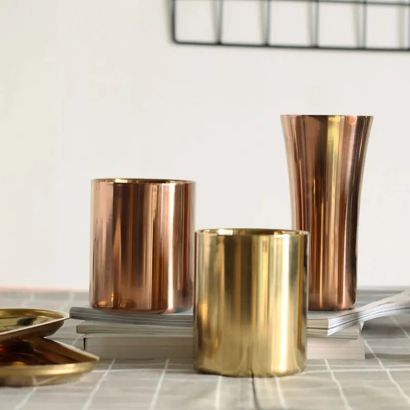 Elevate your workspace with our Rose Gold Stainless Steel Pen Holder, perfect for organizing pens and decor while adding a touch of luxury.
