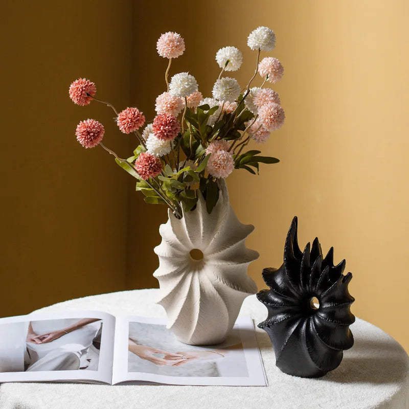 Elevate your home decor with our Ceramic Conch Vase, perfect for showcasing pampas grass and adding a modern touch to any tabletop.