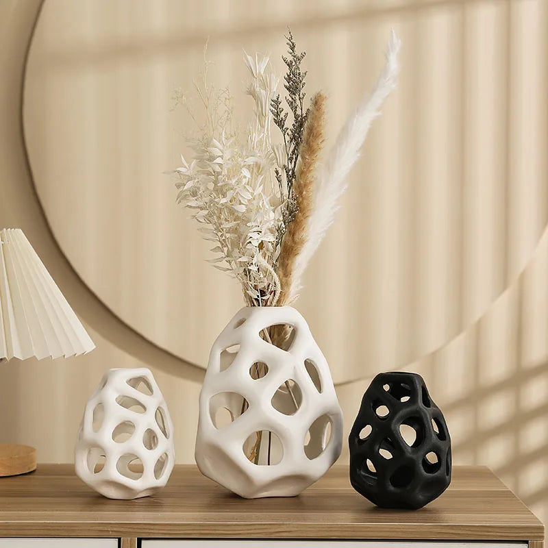 Enhance your space with our Scandinavian Hollow Out Ceramic Vase Set, perfect for home or office decor and thoughtful gifting.