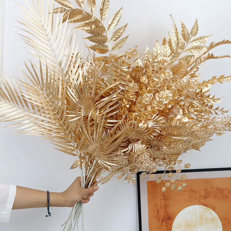 95cm gold artificial eucalyptus and ginkgo leaf stems for elegant home, wedding or event décor—durable plastic faux flowers for long-lasting shimmer.