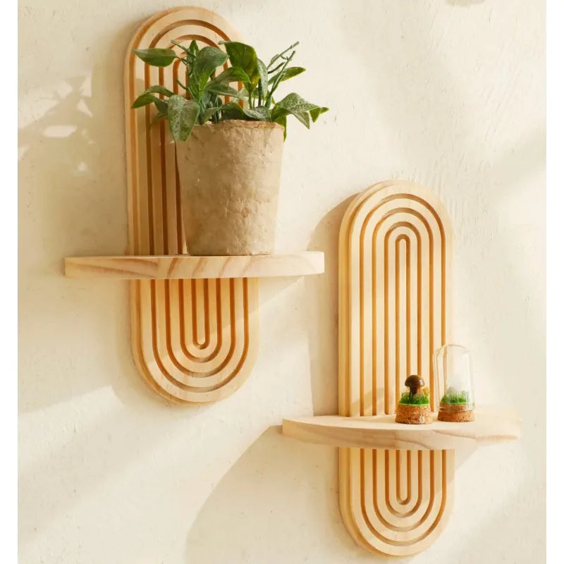 Elevate your decor with our Wooden Boho Wall Mounted Shelf, perfect for showcasing books and plants while adding unique charm to any space.
