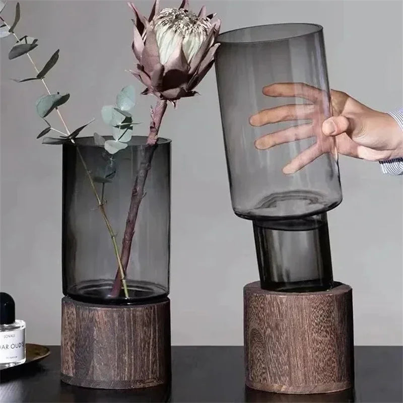 Elevate your home decor with our Vases Simple European hydroponic plant vase featuring a wood base and transparent glass, perfect for any living room table.