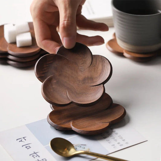 Flower Shaped Traditional Japanese Walnut Wood Coasters offer eco-friendly heat resistance, flower-petal designs, and stylish protection for cups—order now.