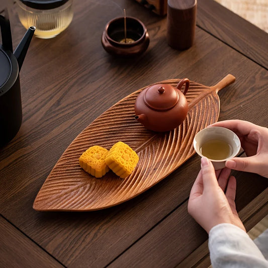 Discover the Lacquered Walnut Leaf-Shaped Tray - A Multifunctional Organizer for Displaying Desserts with Natural Wood Grain Finish, perfect for elegant decor.