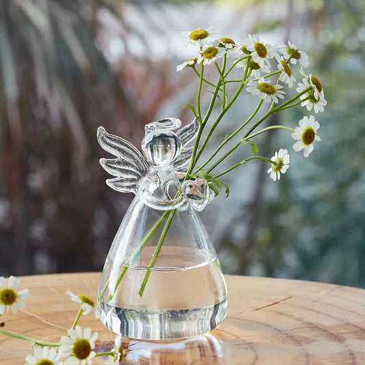 Elegant angel-shaped glass hydroponic vase, perfect for fresh flowers. Ideal gift for loved ones and stunning décor for any space.