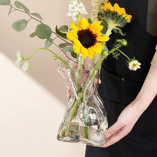 Elevate your decor with our Modern Glass Flower Vase, perfect for hydroponic plants and striking centerpiece displays in any setting.