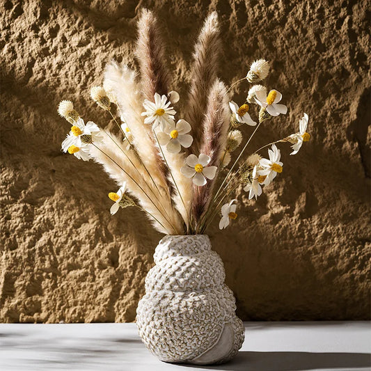 Enhance your decor with our Ceramic Conch Vase, perfect for displaying dried flowers and adding a touch of Wabi Sabi charm to your space.