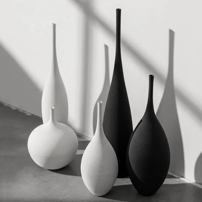 Discover the Minimalist Handmade Art Zen Vase, a stunning black and white ceramic decoration perfect for elevating your living room style.