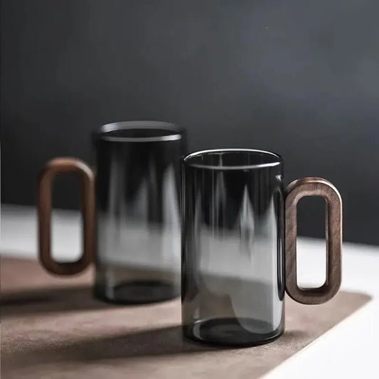 Elevate your drinkware with our Household High Borosilicate Glass Water Cup featuring a stylish wooden handle, perfect for tea and coffee lovers.