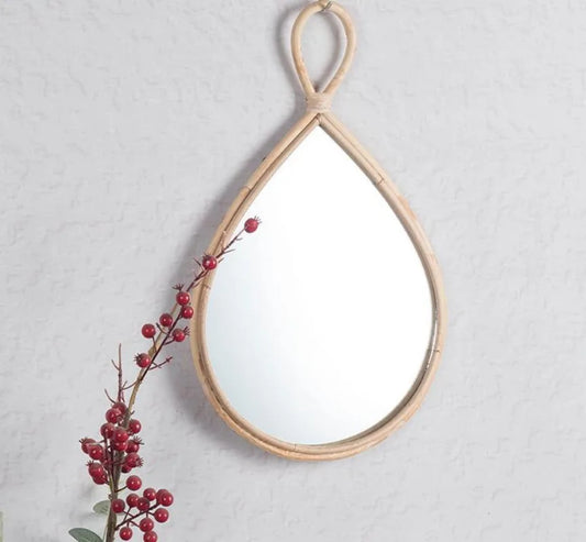 Enhance your space with the Nordic Woven Wall Mirror, a beautifully hand-decorated bamboo mirror perfect for stylish log cabin decor.