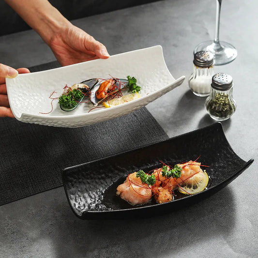 Ceramic Tableware Premium: elevate dining with black-and-white bowls, fish platters, and boat-shaped ceramic dishes; enjoy elegant entertaining, shop now!!