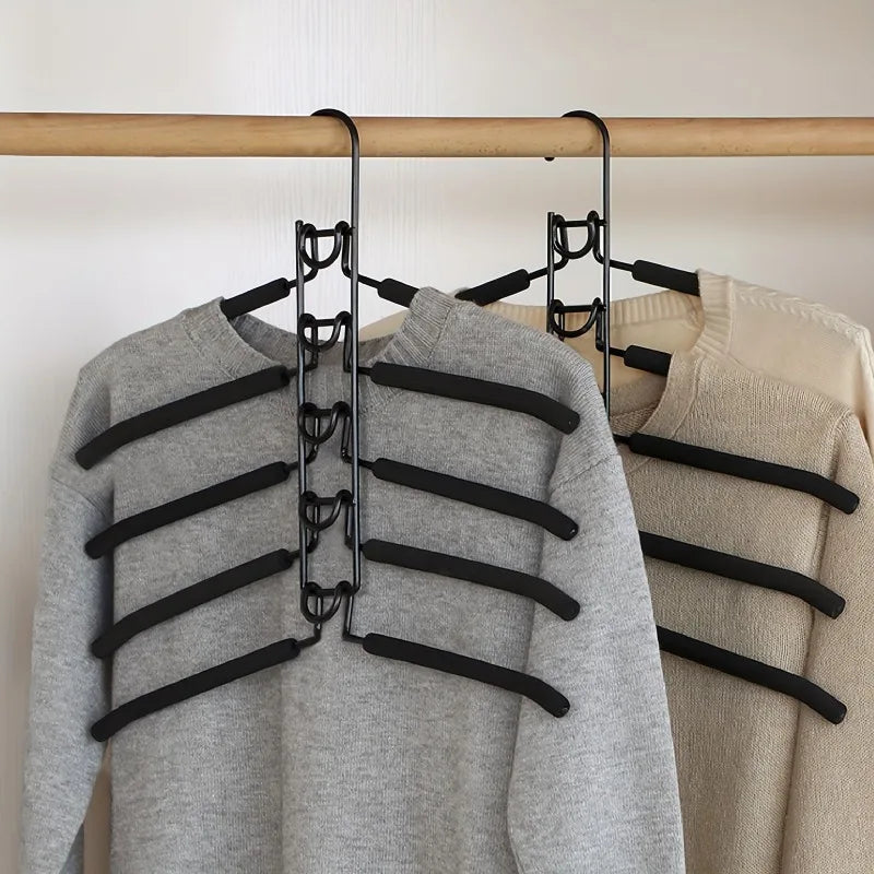 Industrial-Strength Space-Saving Garment Hanger System packs heavy-duty multi-tier metal organization with non-slip pads to maximize closet space—Shop now.