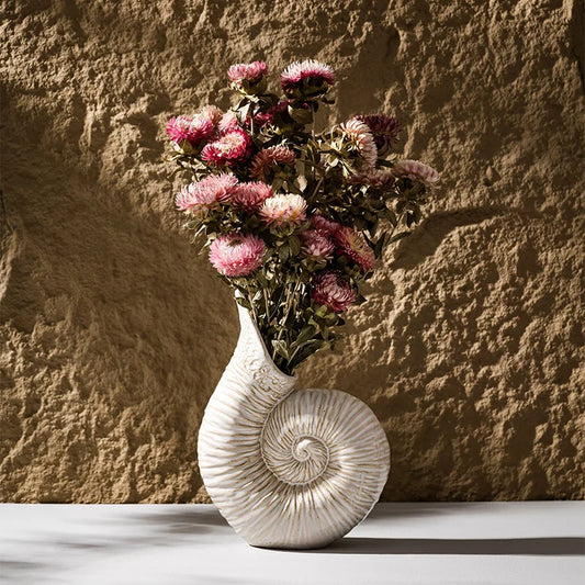 Elevate your space with our Ceramic Conch Vase, perfect for dried pampas grass and a chic modern touch in any living room or office.