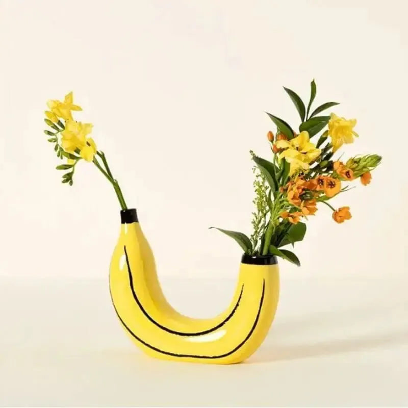 Add a playful touch to your decor with our Cute Banana Shape Flower Vase, perfect for fresh or artificial arrangements in any room.