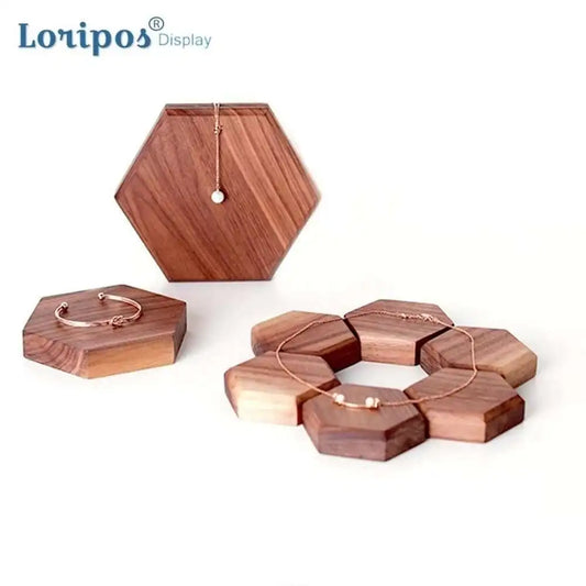 Wooden jewelry display sets with 'Loripos' branding on a white background