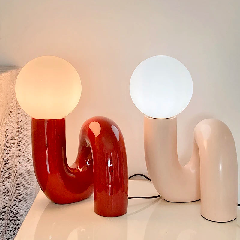 Desk Lamp fuses Nordic postmodern resin with a glass moon lampshade delivering a warm 7W study light for bedrooms and living rooms at home today- Shop now.