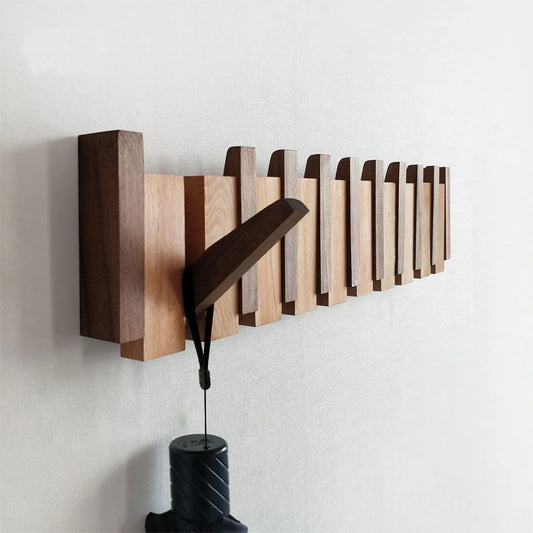 Walnut Wood Grain Finish Wall-Mounted Coat Rack with hidden folding hook saves space, organizes entryways, and adds stylish decor; upgrade your home, shop now.