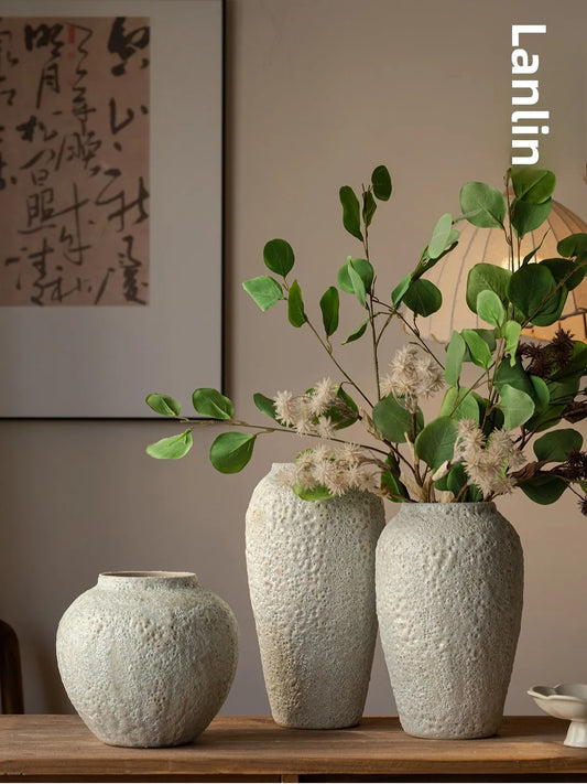 Ceramic Vase brings rustic white porcelain charm with minimalist, durable decor; perfect for any room, it adds style and versatility to your space-shop now