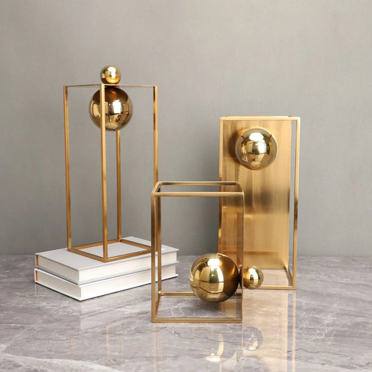 Elevate your home decor with our Geometric Metal Sculpture Decorative Box, featuring a modern gold frame and abstract design for a stylish touch.