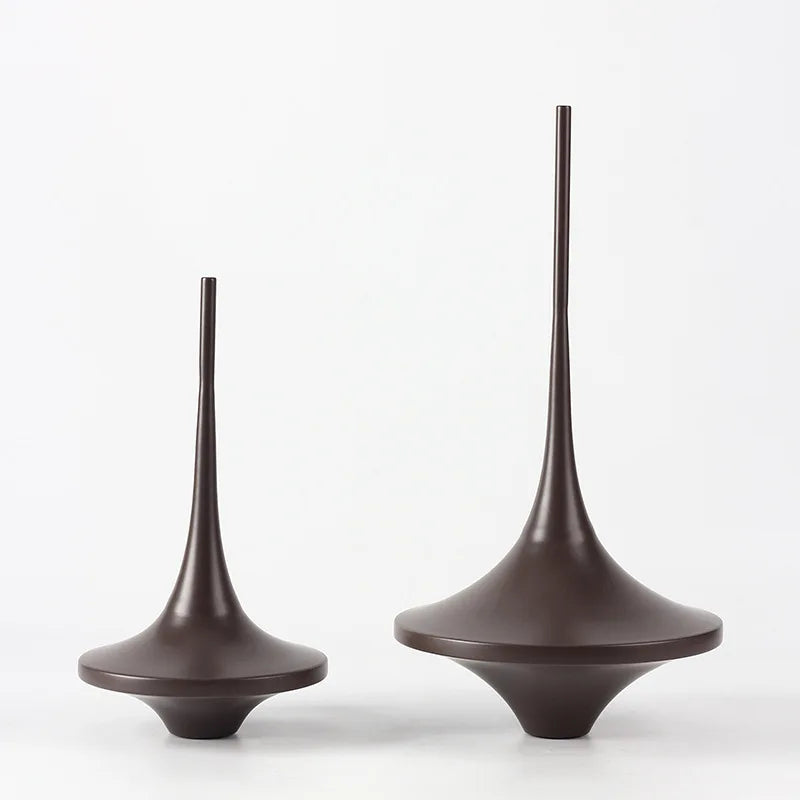 Discover intricately geometric metal spinning decorations, handcrafted for elegant home decor that adds a unique, spinning charm to any space—elevate your interior design today!