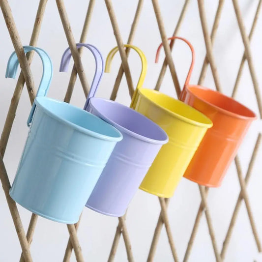 Iron Hanging Flower Pot with Detachable Hook delivers durable metal construction and space-saving versatility for balconies, windows, or gardens—order now!