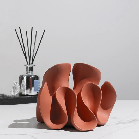 Elevate your decor with our modern Resin Geometric Petal Sculpture, a stunning piece perfect for any space.