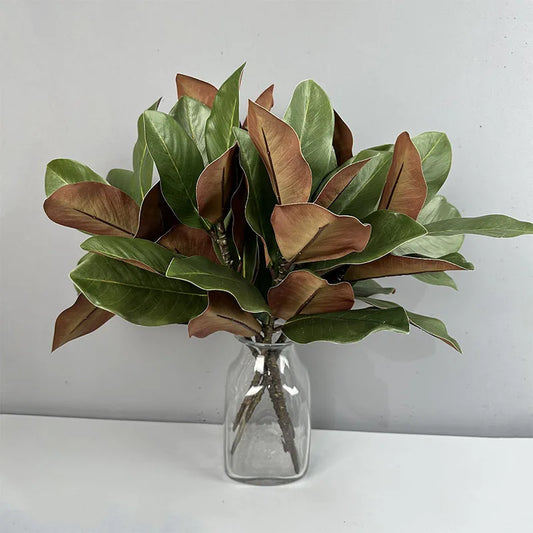 Enhance your decor with our Artificial Magnolia Leaf Branches, perfect for bridal showers and stylish arrangements, featuring 2pcs of stunning greenery.