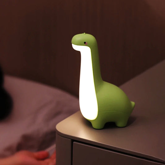 Illuminate your child's room with our Cute Dinosaur Night Light, a charming and adjustable bedside lamp perfect for sweet dreams and cozy decor.