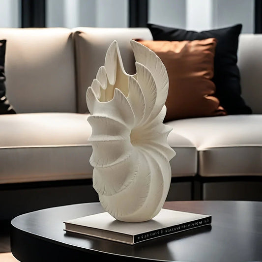 Elevate your home decor with the Collarbone Ceramic Flower Vase, a stunning minimalist art piece perfect for showcasing your favorite blooms.