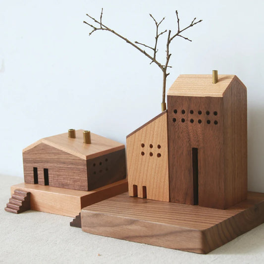 Wooden architectural models on a neutral background