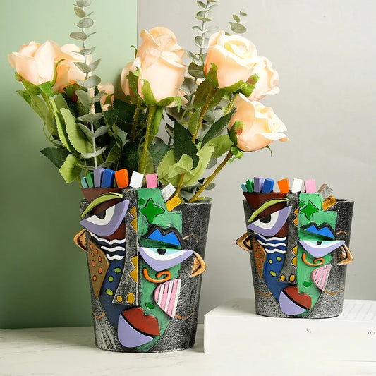 Elevate your decor with the Abstract Face Flower Pot Unique Head Vase, a Picasso-style planter with drainage for home and garden gifts.