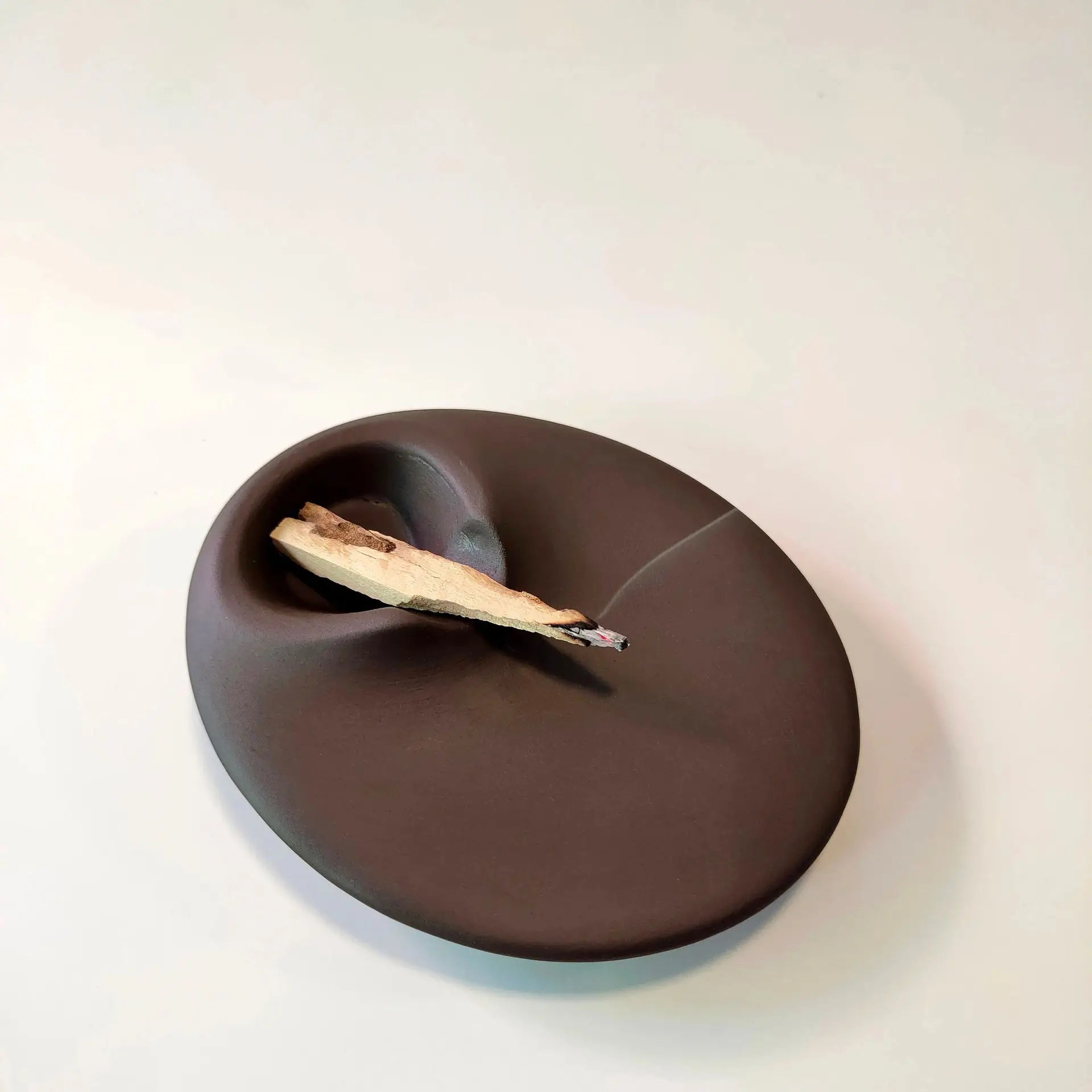 Peruvian Incense Burner blends sacred wood eco with a sturdy cement stand for serene meditation; ignite tranquility and elevate your space today, shop now.