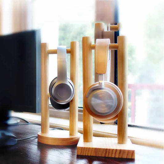 Elevate your space with the Solid Wood Headphone Stand, a stylish and functional headset hanger for organized and easily accessible headphones.