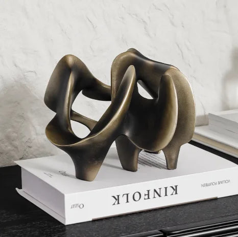 Resin sculpture centerpiece: handcrafted, modern hollow design elevates any table for home or office decor; create striking focal points for spaces—shop now.