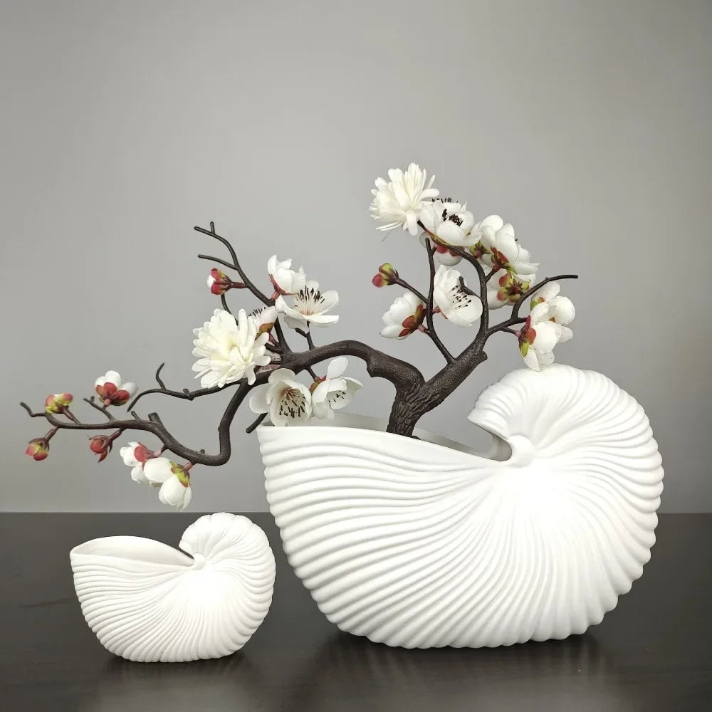 Elevate your space with our Ceramic Shell Conch Vase, perfect for elegant flower arrangements and modern boho home decor.