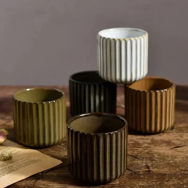 Discover the 1PC Japanese Style Retro Ceramic Tea Cup, perfect for tea, sake, coffee, wine, or water, adding elegance to your household afternoon.