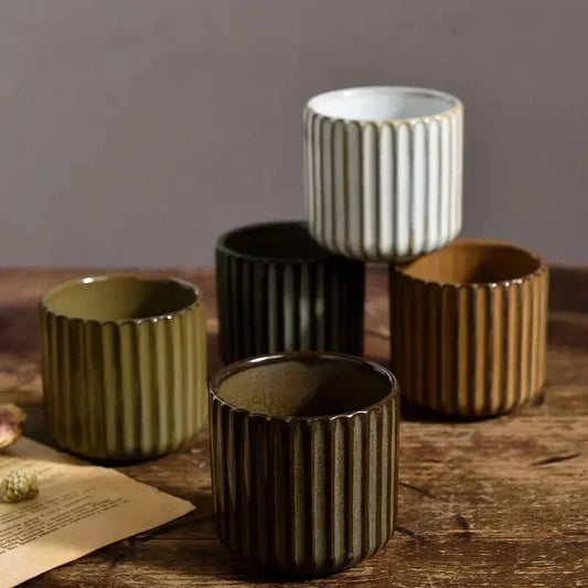 Discover the 1PC Japanese Style Retro Ceramic Tea Cup, perfect for tea, sake, coffee, wine, or water, adding elegance to your household afternoon.