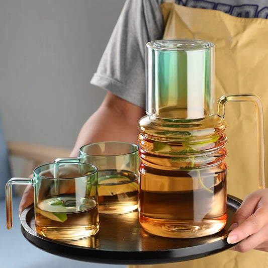 Elevate your kitchen with our 1.4L Gradient Glass Water Bottle Set. Stylish gradient design, high borosilicate glass, safe for hot and cold liquids.