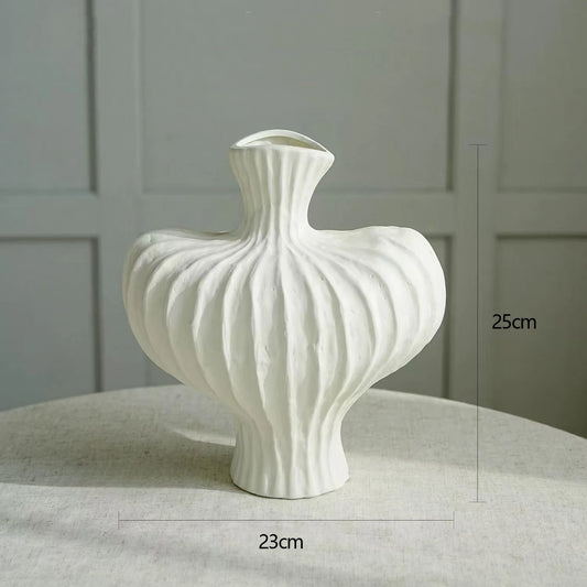 Elevate your decor with our Plastic Flower Vase for Home, perfect for showcasing beautiful bouquets in a stylish and simple design.