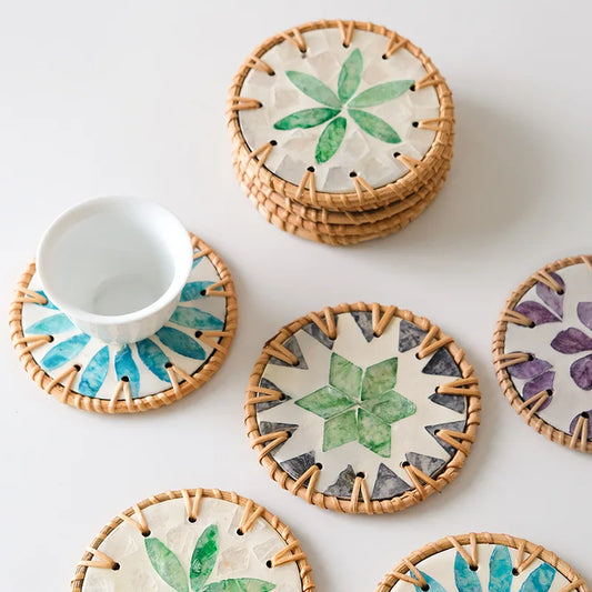 Vine Woven Ceramic Insulation Placemat delivers heat protection and rustic elegance with handwoven rattan, ceramic, and shell accents—buy yours today, now!