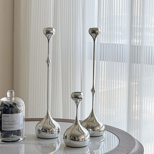 Illuminate your space with this elegant stainless steel silver candle holder, perfect for home dining, romantic settings, and wedding photography props.