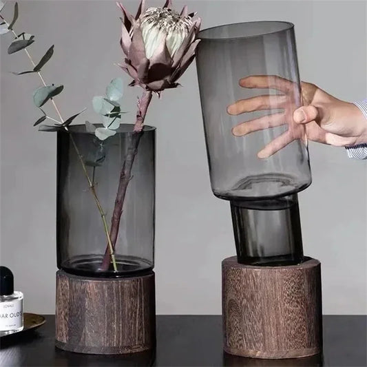 Elevate your home decor with our Vases Simple European hydroponic plant vase featuring a wood base and transparent glass, perfect for any living room table.